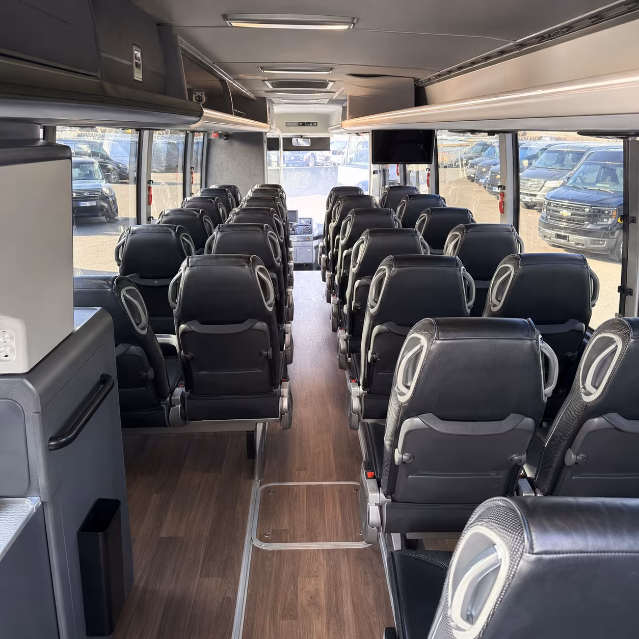 how one way transfers round trips and multi day bookings are priced for bus rentals in mansfield texas